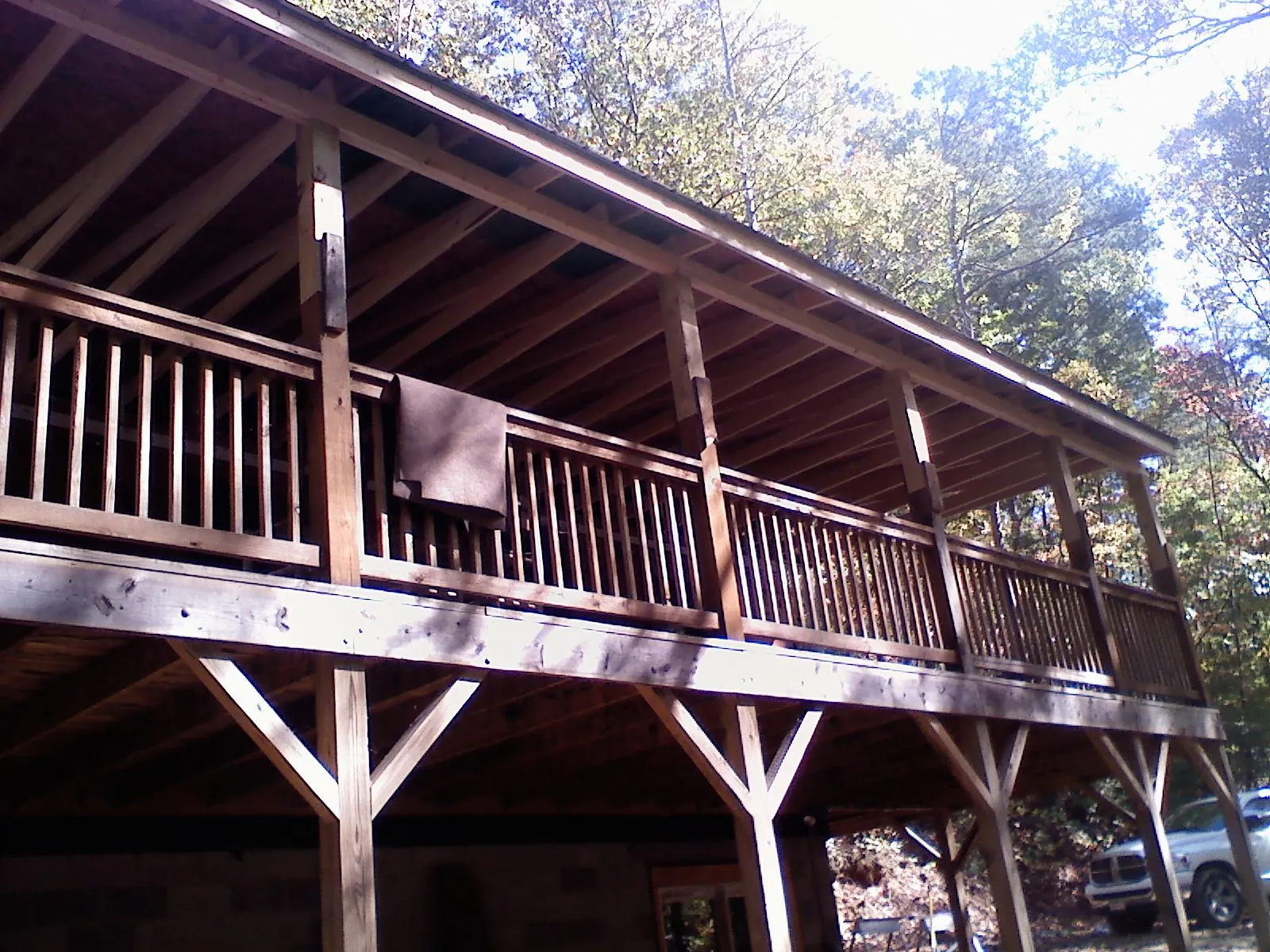 Timber framing under a new elevated porch and deck — Roof Leak Repair in Stow by Roofing Brothers